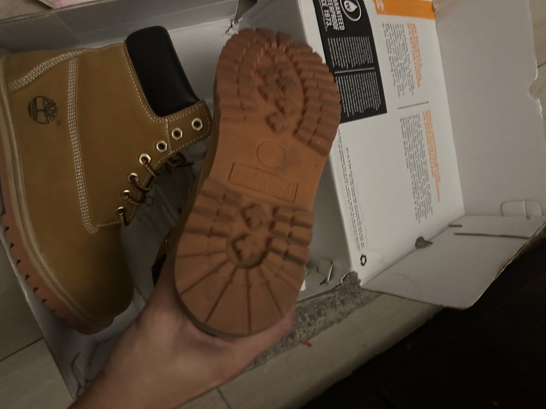 Timberland Premium Waterproof Boots - Wheat Nubuck (Category: Boots) located in Manila. Submitted by zeldeclutter (Listing ID 1438688870, Image 2). Description: - Wheat nubuck leather - Size: 9W - Model: TB 010061 T13 - Includes original box - Classic Timberland design - Waterproof - Suitable for all weather conditions.