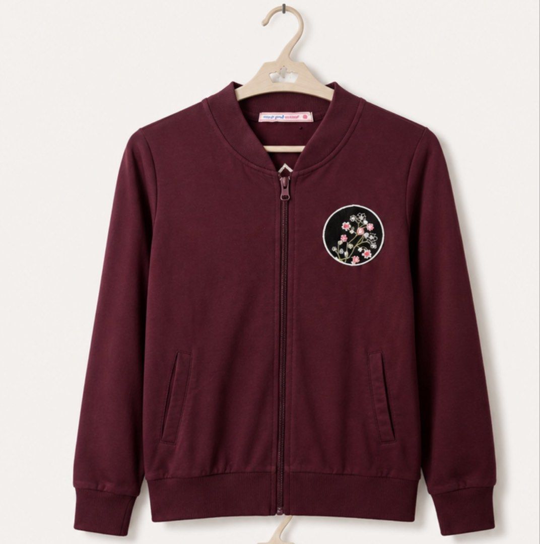 Tokyo Japan Embroidered Bomber Jacket (Category: Coats, Jackets and Outerwear) located in Taguig. Submitted by julia_choose (Listing ID 1438676634, Image 1). Description: - Maroon bomber jacket - Full zip closure - Embroidered floral patch on front - Detailed Tokyo Japan design on back - Features map of Japan with embroidered elements (torii gate, cherry blossoms, food items) - Ribbed cuffs and hem Note: If you are willing to buy the other sweate