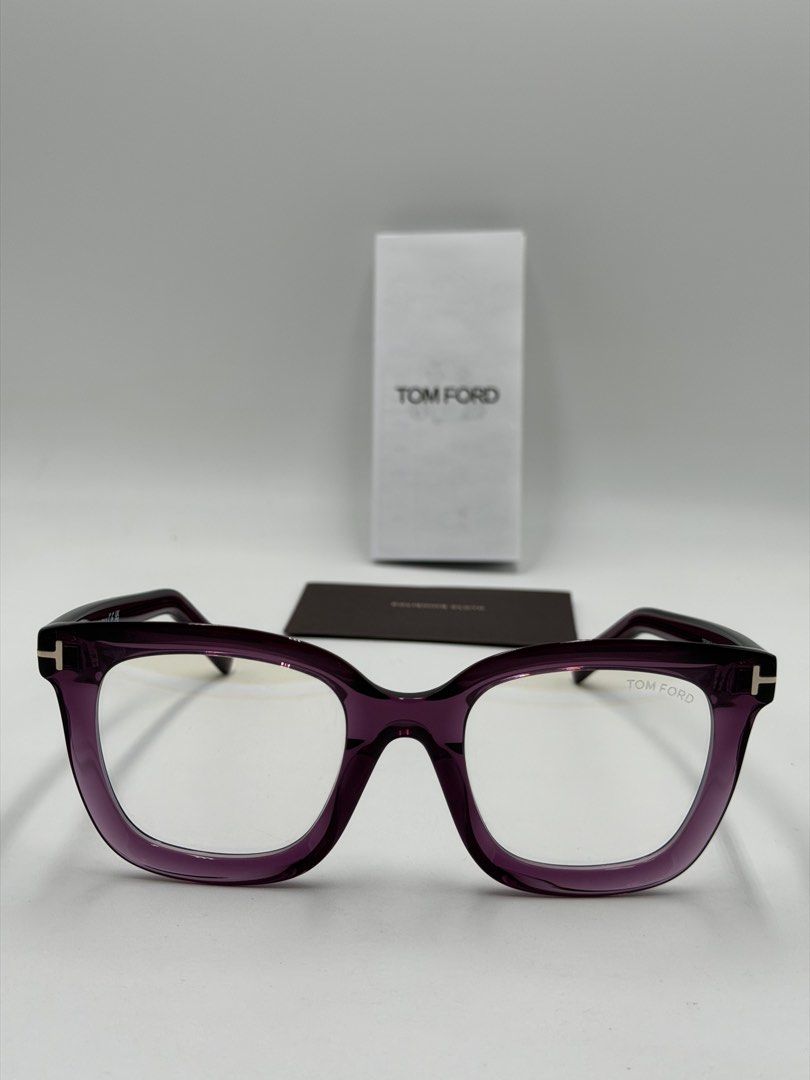 Tom Ford FT5880-B Square Glasses (Category: Luxury Accessories) located in Quezon City. Submitted by _cmluxephilippines (Listing ID 1438652217, Image 1). Description: Tom Ford FT5880-B Square Glasses in the Shiny Violet / Transparent Purple colorway (color code 081). They feature signature gold-tone "T" logo inserts at the hinges and come equipped with clear, blue-light-blocking lenses. Brand: Tom Ford Eyewear Model Number: FT5880-B (also referen
