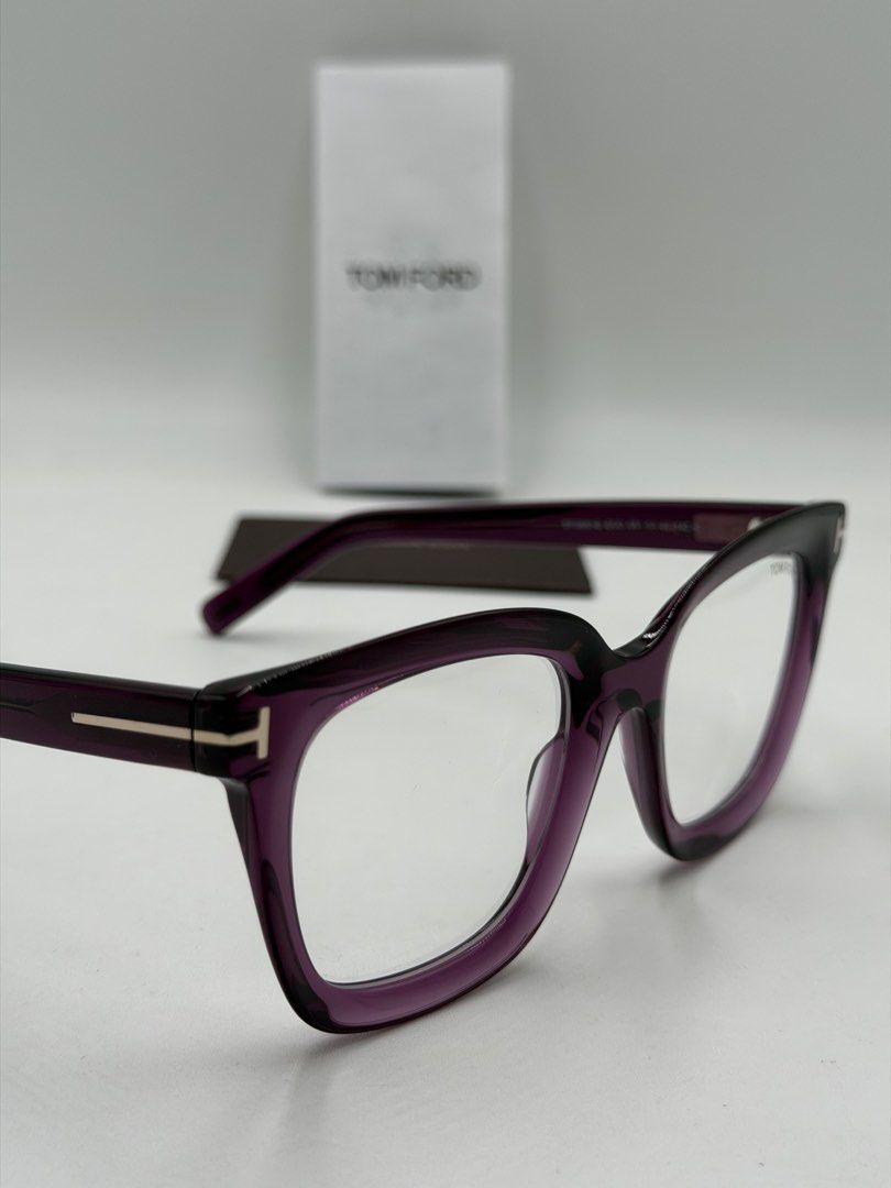 Tom Ford FT5880-B Square Glasses (Category: Luxury Accessories) located in Quezon City. Submitted by _cmluxephilippines (Listing ID 1438652217, Image 3). Description: Tom Ford FT5880-B Square Glasses in the Shiny Violet / Transparent Purple colorway (color code 081). They feature signature gold-tone "T" logo inserts at the hinges and come equipped with clear, blue-light-blocking lenses. Brand: Tom Ford Eyewear Model Number: FT5880-B (also referen