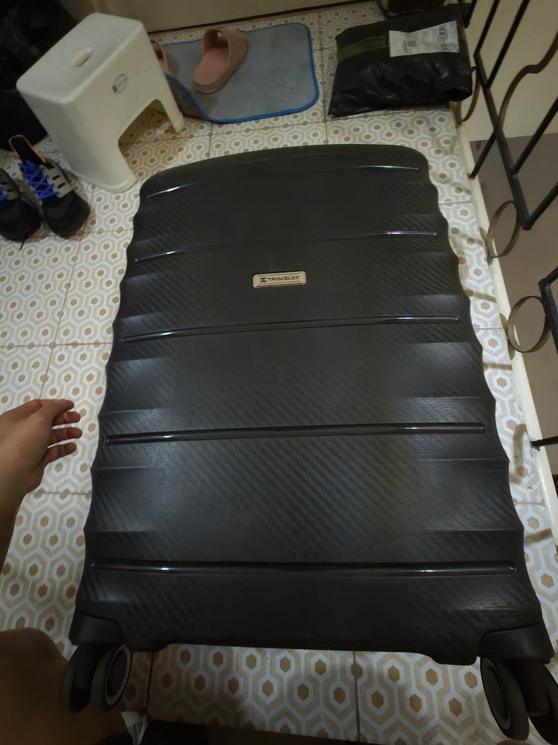 Travel Luggage Suitcase (Category: Luggage) located in Pasig City. Submitted by borjong (Listing ID 1438574113, Image 1). Description: - Durable travel luggage - Textured exterior - Secure zipper closure - Integrated combination lock - Cross -Rotating wheels for transport Medium Size 24" 20Kilo Capacity for pick up only - Wheels for easy transport.
