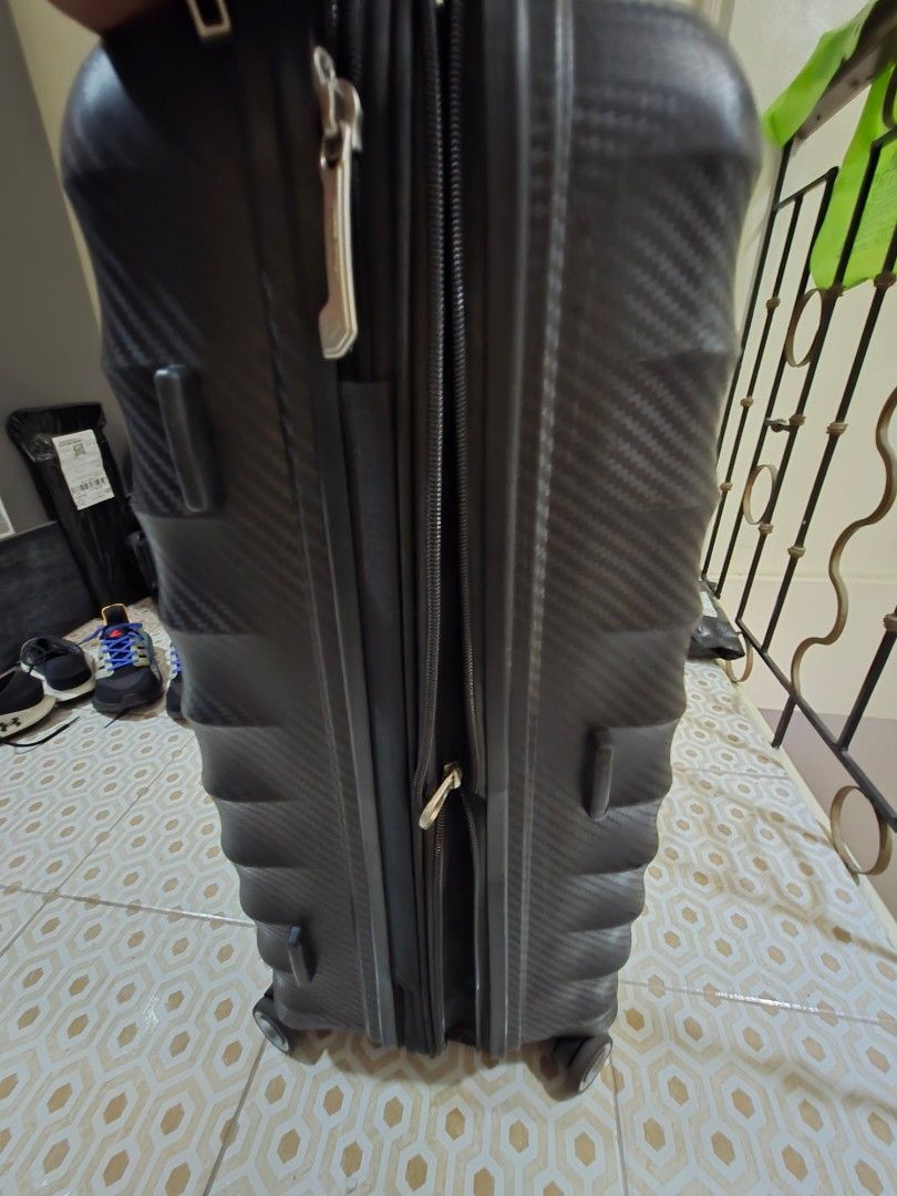 Travel Luggage Suitcase (Category: Luggage) located in Pasig City. Submitted by borjong (Listing ID 1438574113, Image 3). Description: - Durable travel luggage - Textured exterior - Secure zipper closure - Integrated combination lock - Cross -Rotating wheels for transport Medium Size 24" 20Kilo Capacity for pick up only - Wheels for easy transport.