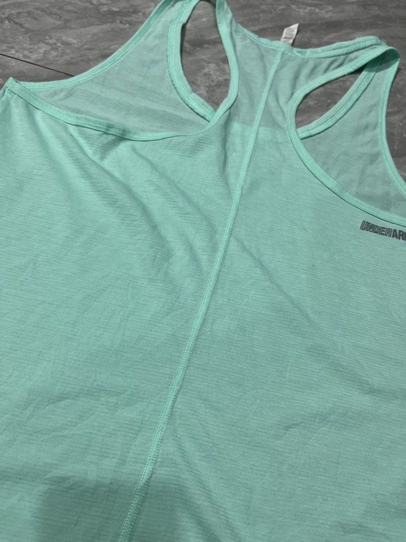Under Armour HeatGear running singlet - Pickleball Tops - Running Tops - Activewear Tops (Category: Activewear) located in Palayan City. Submitted by erae_lf (Listing ID 1438660762, Image 3). Description: UA HG running tee Authentic Like new No issue 10/10 overall Size L Length 25” Width 18” Loc. Palayan City Nueva Ecija.