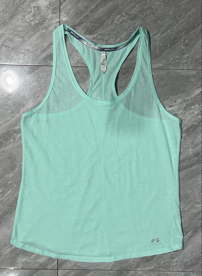 Under Armour HeatGear running singlet - Pickleball Tops - Running Tops - Activewear Tops (Category: Activewear) located in Palayan City. Submitted by erae_lf (Listing ID 1438660762, Image 1). Description: UA HG running tee Authentic Like new No issue 10/10 overall Size L Length 25” Width 18” Loc. Palayan City Nueva Ecija.
