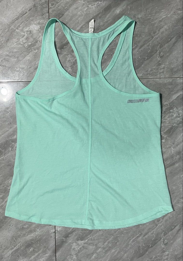 Under Armour HeatGear running singlet - Pickleball Tops - Running Tops - Activewear Tops (Category: Activewear) located in Palayan City. Submitted by erae_lf (Listing ID 1438660762, Image 2). Description: UA HG running tee Authentic Like new No issue 10/10 overall Size L Length 25” Width 18” Loc. Palayan City Nueva Ecija.