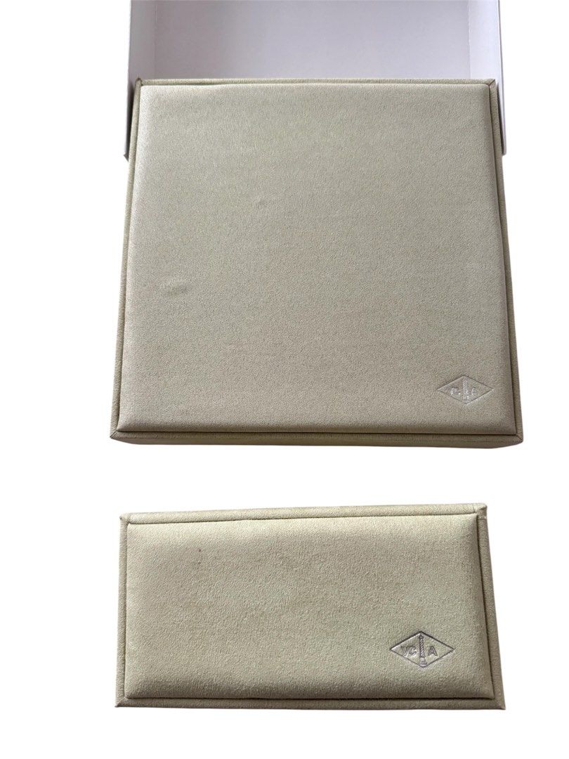 Van Cleef & Arpels Jewelry Box Set (Category: Accessory Holder, Box & Organizers) located in Mandaluyong City. Submitted by autumndei (Listing ID 1438532094, Image 2). Description: - mirror copy Van Cleef & Arpels jewelry box set - Includes: - Two boxes with black interior - Paper bag - Certificate - Brand name printed on boxes and paper bag - for necklace and bracelet.
