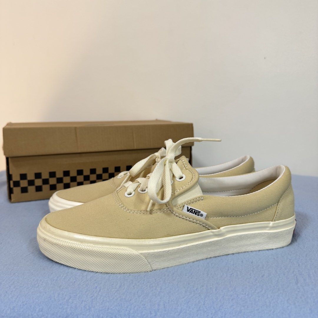 Vans Era Beige Sneakers Slip ons (Category: Sneakers) located in Pasig City. Submitted by r91294 (Listing ID 1438556957, Image 2). Description: - Vans Era sneakers - Beige canvas upper - Lace-up closure - White midsole - Vans logo detail - Includes original box - Size: US Men's 7, Women's 8, 25cm,.