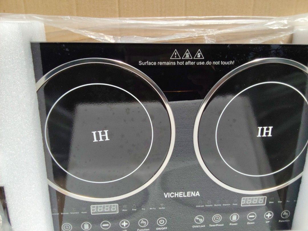 VicheLena Original Electromagnetic Cooking Stove (Category: Cookers) located in Rizal. Submitted by y4niii (Listing ID 1438644782, Image 2). Description: - Double induction cooker - Two cooking zones with digital displays - Includes instruction manual - Surface remains hot after use - Features ventilation fans and power cord - Brand new in original packaging rush 7k negotiable .