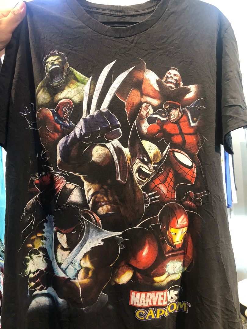 Video Game Big Print Mad Engine Marvel vs Capcom Mens Shirt (Category: Tshirts & Polo Shirts ) located in Los Banos. Submitted by ayeeeel (Listing ID 1438686512, Image 2). Description: Video Game Big Print Mad Engine Marvel vs Capcom Mens Shirt SIZE : LARGE DIMES : W23 X L30 COLOR RATE : 100000000🔥/ 10 CONDITION : LIKE NEW CONDITION ISSUE : Fade Print Tag Price + SF Courier : J&7 ‼️PWEDE TUMAWAD WAGLANG SAGAD‼️ LOCATION : LOSBAÑOS LAGUNA.