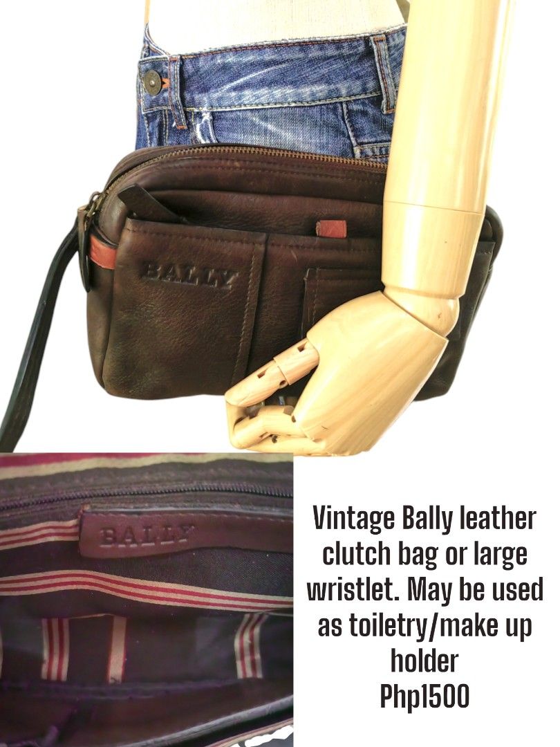 Vintage Bally Leather Clutch Bag (Category: Luxury Bags & Wallets) located in Davao. Submitted by gelleevanelli (Listing ID 1438647453, Image 1). Description: - Vintage Bally leather clutch/wristlet - Main compartment with zipper - Exterior pocket - Embossed Bally logo - Includes wrist strap - Versatile use: toiletry or makeup holder.