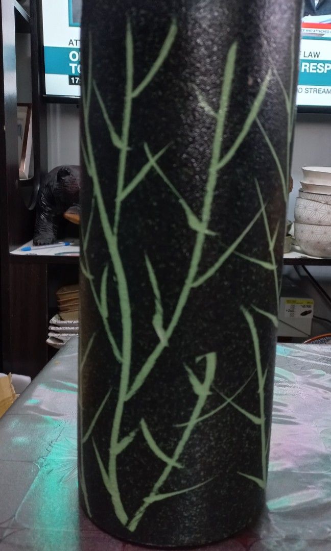 Vintage Japanese ceramic vase (Category: Vases & Decorative Bowls) located in Quezon City. Submitted by sabadojuliet25680 (Listing ID 1438591633, Image 2). Description: vintage Japanese ceramic vase texture black finish an green bamboo branch design goods no issue size 4.15x11 inches.