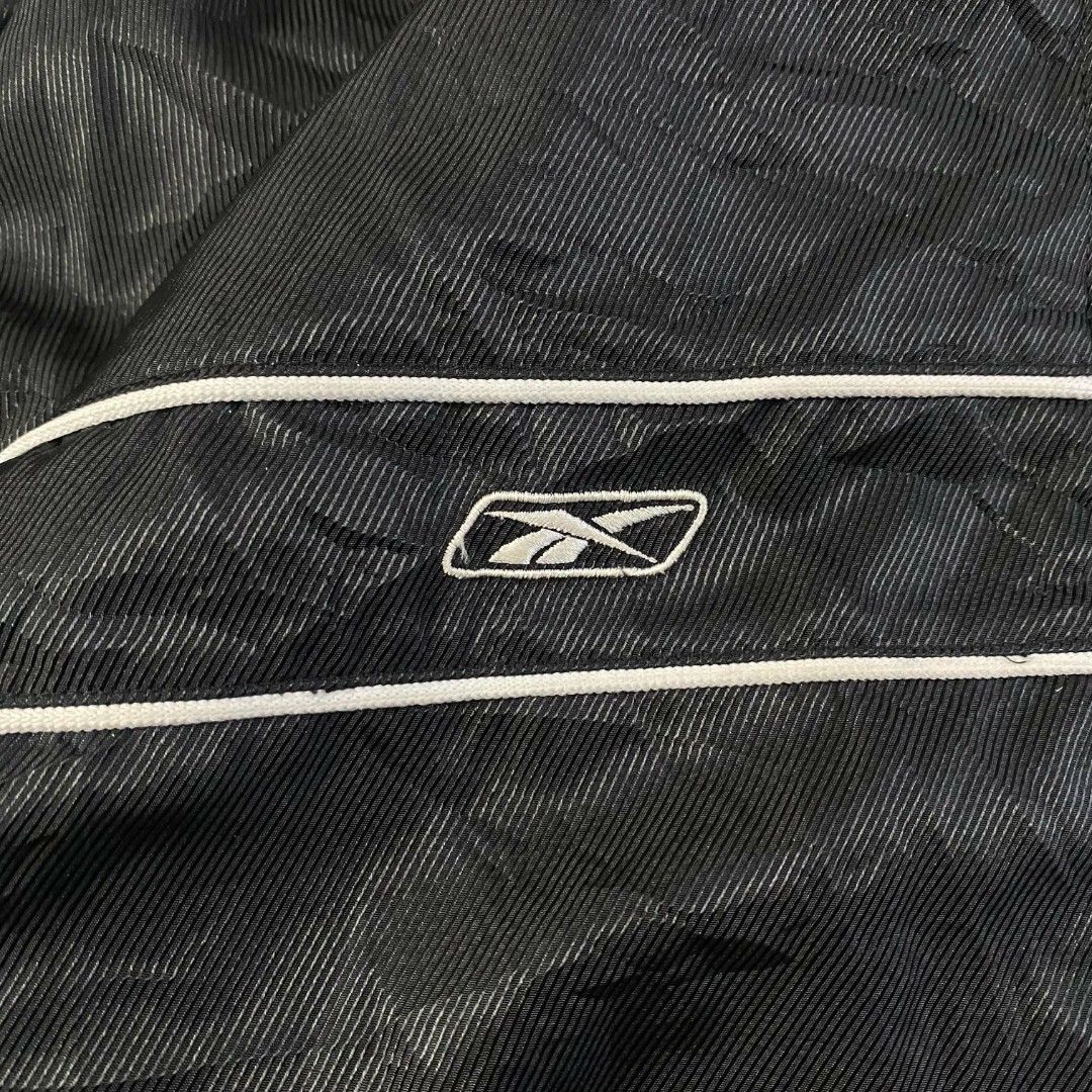 Vintage Y2K Reebok windbreaker (Category: Coats, Jackets and Outerwear) located in Manila. Submitted by jayvee-92b986 (Listing ID 1438538485, Image 3). Description: y2k reebok windbreaker size medium on tag up to large no issue 10/10 color rate.