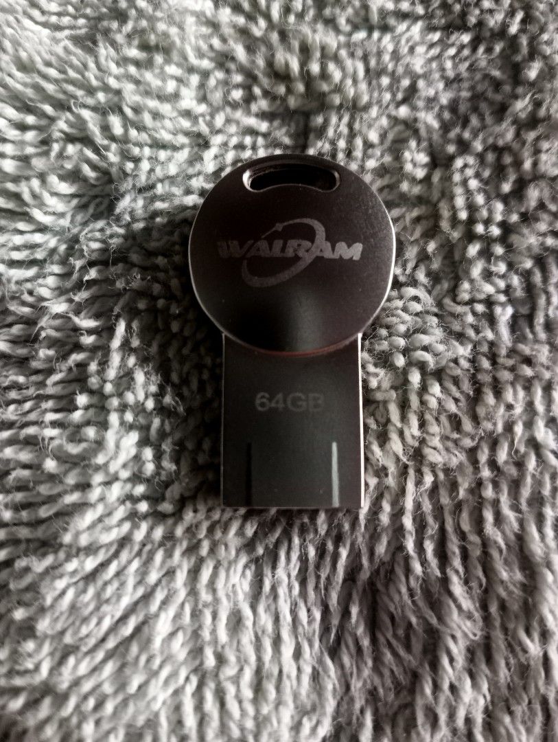 Walram 64GB USB Flash Drive (Category: Hard Disks & Thumbdrives) located in Manila. Submitted by escosurayu30474 (Listing ID 1438542246, Image 1). Description: - 64GB Walram USB Flash Drive - Sleek, dark design - Durable metal build - Circular cap - Compact size - Keyhole design for easy attachment to keychains/lanyards - Ready to use.