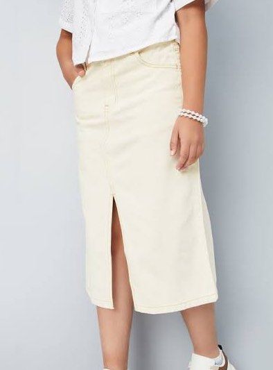 White denim midi skirt (Category: Skirts) located in Taytay. Submitted by oreomatcha (Listing ID 1438577428, Image 1). Description: Issue: has stain but not noticeable Size: 25-26 waistline, length: 27.5 inches Price is negotiable .