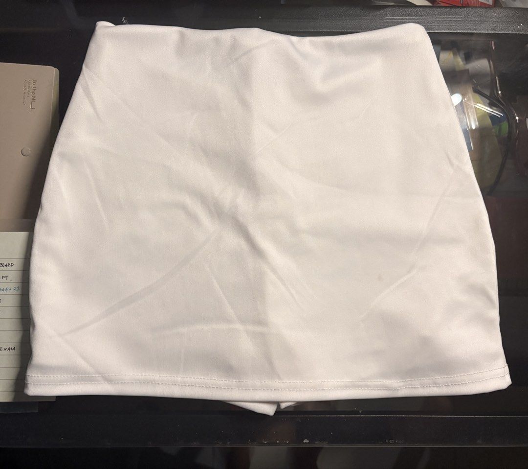 White Mini Skirt (Category: Skirts) located in Manila. Submitted by declutterbymiks (Listing ID 1438624957, Image 2). Description: - White mini skirt - brand new - loc : Sampaloc Manila.