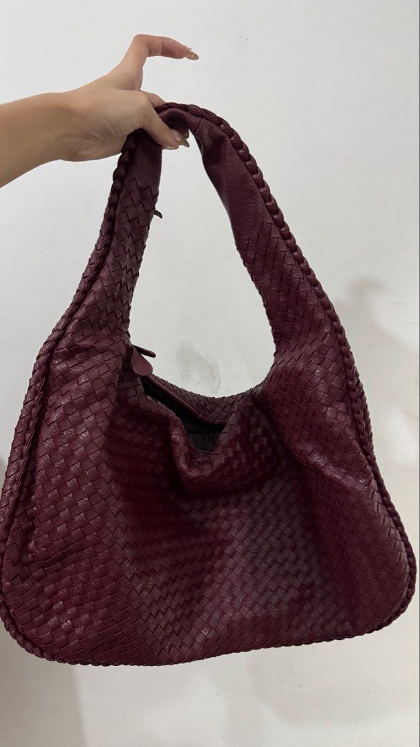 Woven Shoulder Bag - Burgundy (Category: Shoulder Bags) located in Paranaque City. Submitted by caseycunanan (Listing ID 1438571859, Image 1). Description: - Burgundy woven shoulder bag - Braided strap - Zippered main compartment - Interior zippered pockets - Soft, slouchy shape - Woven exterior pattern.