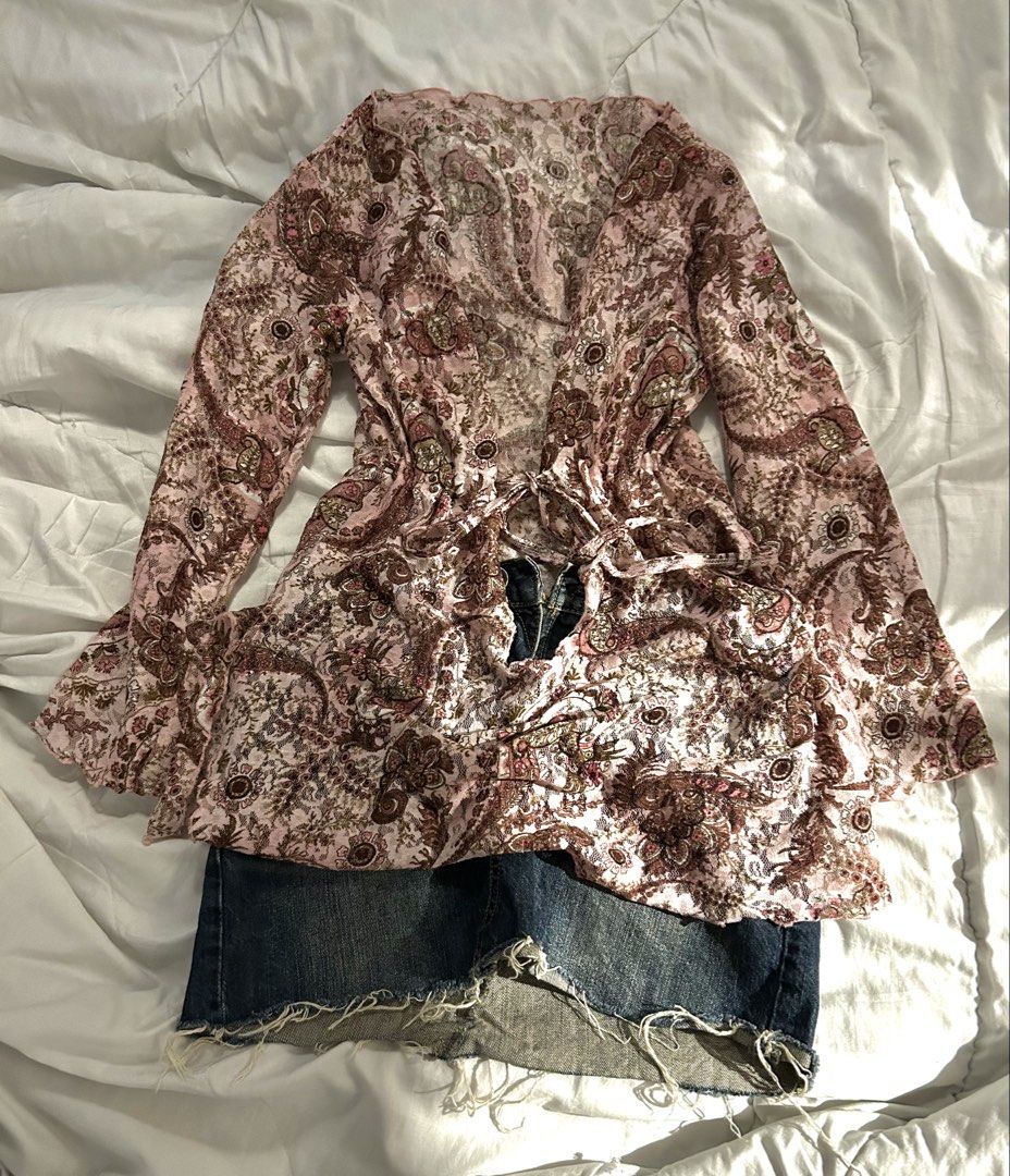 Y2K Bohemian Floral Top (Category: Blouses) located in Manila. Submitted by bobsstash (Listing ID 1438588128, Image 1). Description: - good for SMALL TO MEDIUM - Bohemian floral print top - Long v-neck cut - Long sleeves - Tie closure at waist - Flowing design - Lightweight, sheer fabric - Color palette: pink, brown, white - Versatile style (good for bikini cover up) .