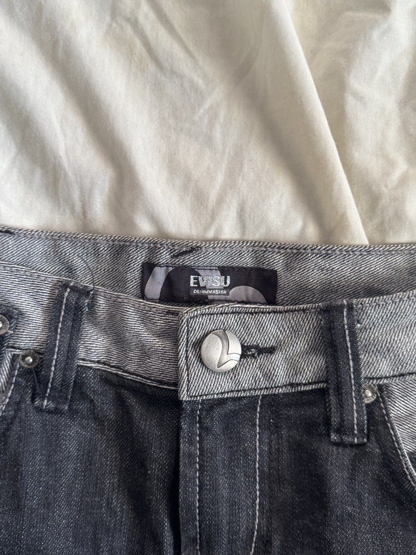 Y2K Evisu Genes Denim Mini Skirt (Category: Skirts) located in Davao. Submitted by dopestuffdvo (Listing ID 1438561781, Image 3). Description: - Evisu Genes denim skirt - Dark wash - Size 26 - Evisu logo on back pockets - "EVISUGENES" lettering - Two-tone design with grey waistband - Y2K Style.