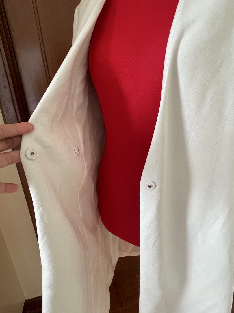 Zara Basic White Coat (Category: Coats, Jackets and Outerwear) located in Quezon City. Submitted by mymini.closet (Listing ID 1438502791, Image 3). Description: - Zara Basic white coat - Size: S git up to Large - Features a longline design - Single button closure - Simple and elegant style - Made in Vietnam - bought in vietnam - minor tear in the lining at the back Not noticeable when wear .