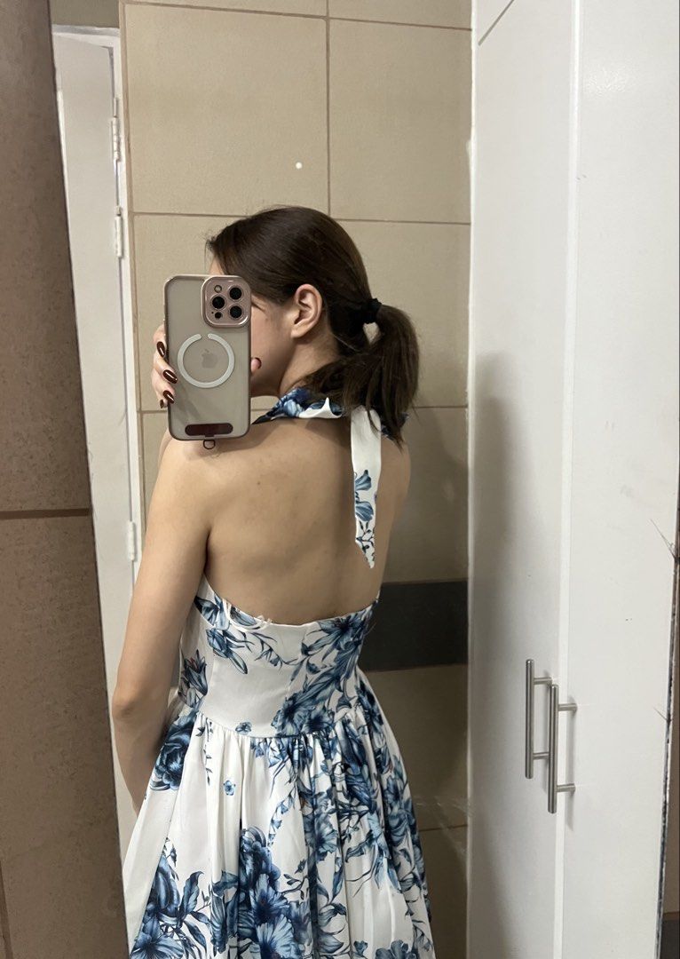 Zara Floral Halter Dress (Category: Dresses) located in Makati City. Submitted by jcc999 (Listing ID 1438570301, Image 2). Description: - Zara floral dress - Size: S - Color: Blue and white floral print - Design: Halter neckline, flared skirt - Made in: Morocco - Perfect for: Summer outings, special occasions - Silhouette: Flattering.