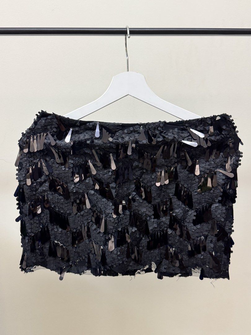 Zara Sequin Skort - XS (Category: Sleeveless) located in Paranaque City. Submitted by panmakes (Listing ID 1438636996, Image 1). Description: - Zara black sequin skort - Size: XS - Unique design with dangling sequins - Made in Morocco - Perfect for special occasions or a night out - Stylish and eye-catching.