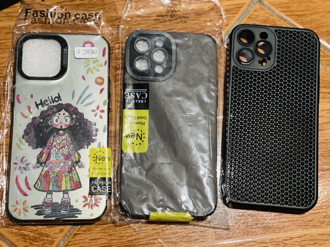 12 PRO MAX CASES (Category: Cases & Sleeves) located in Mandaluyong City. Submitted by imimimi (Listing ID 1438878305, Image 1). Description: Used but not abused cases for Iphone 12 Promax (yung iba once or twice lang nagamit) 3 for 100 only Free 1 case sa 200 ang bibilin choice ni seller.