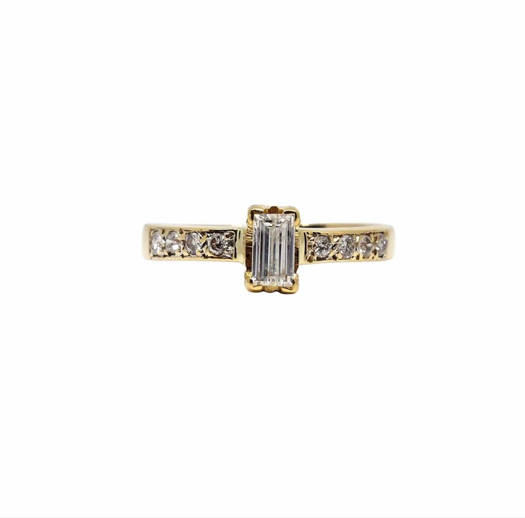 14k Gold Emerald Cut Natural Diamond ring (Category: Rings) located in Las Pinas. Submitted by kluxuryshop (Listing ID 1438776215, Image 1). Description: Bought from Cebuana Lhuillier Jewelry Premium Ring with natural Diamonds Karat: 14K Weight: 2.3 grams Size: 6 Markings: None Details: 1BAG 8BTES S-6 BUO yung diamond in the middle not Illusion. With Cebuana premium Authenticity card. & ring box included. NOTE: white gold ring is only for compari