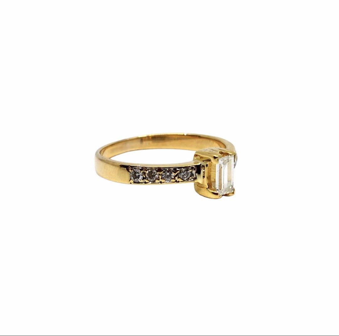 14k Gold Emerald Cut Natural Diamond ring (Category: Rings) located in Las Pinas. Submitted by kluxuryshop (Listing ID 1438776215, Image 2). Description: Bought from Cebuana Lhuillier Jewelry Premium Ring with natural Diamonds Karat: 14K Weight: 2.3 grams Size: 6 Markings: None Details: 1BAG 8BTES S-6 BUO yung diamond in the middle not Illusion. With Cebuana premium Authenticity card. & ring box included. NOTE: white gold ring is only for compari
