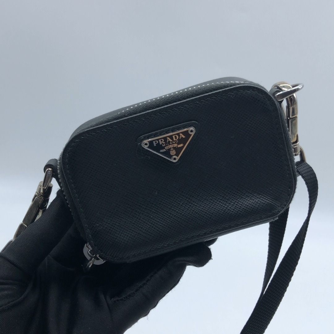 267004244 PRADA BAG SAFFIANO SLING (Category: Luxury Bags & Wallets) located in Taguig. Submitted by ecoring.ph (Listing ID 1438762123, Image 1). Description: ◆CONDITION: B ◆DESCRIPTIONS: (Other defects/info:) OUTER: The body of the bag is scratched, scuffed, has press marks, is slightly deformed, has minimal stains and dirt, and shows signs of use. The rubber lining of the bag has minimal scratches, is scuffed, has press marks, is stained, and s