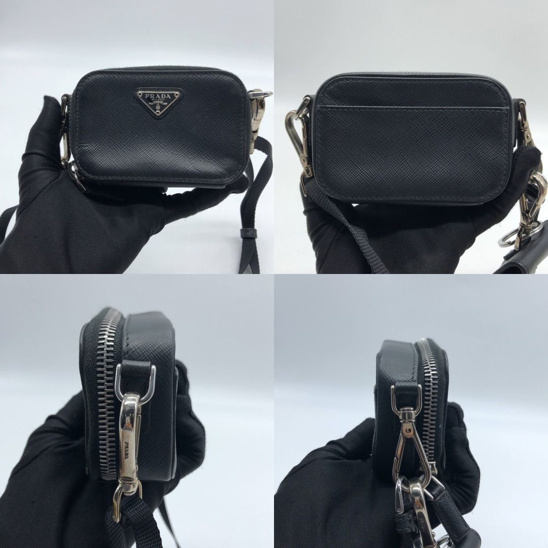 267004244 PRADA BAG SAFFIANO SLING (Category: Luxury Bags & Wallets) located in Taguig. Submitted by ecoring.ph (Listing ID 1438762123, Image 2). Description: ◆CONDITION: B ◆DESCRIPTIONS: (Other defects/info:) OUTER: The body of the bag is scratched, scuffed, has press marks, is slightly deformed, has minimal stains and dirt, and shows signs of use. The rubber lining of the bag has minimal scratches, is scuffed, has press marks, is stained, and s