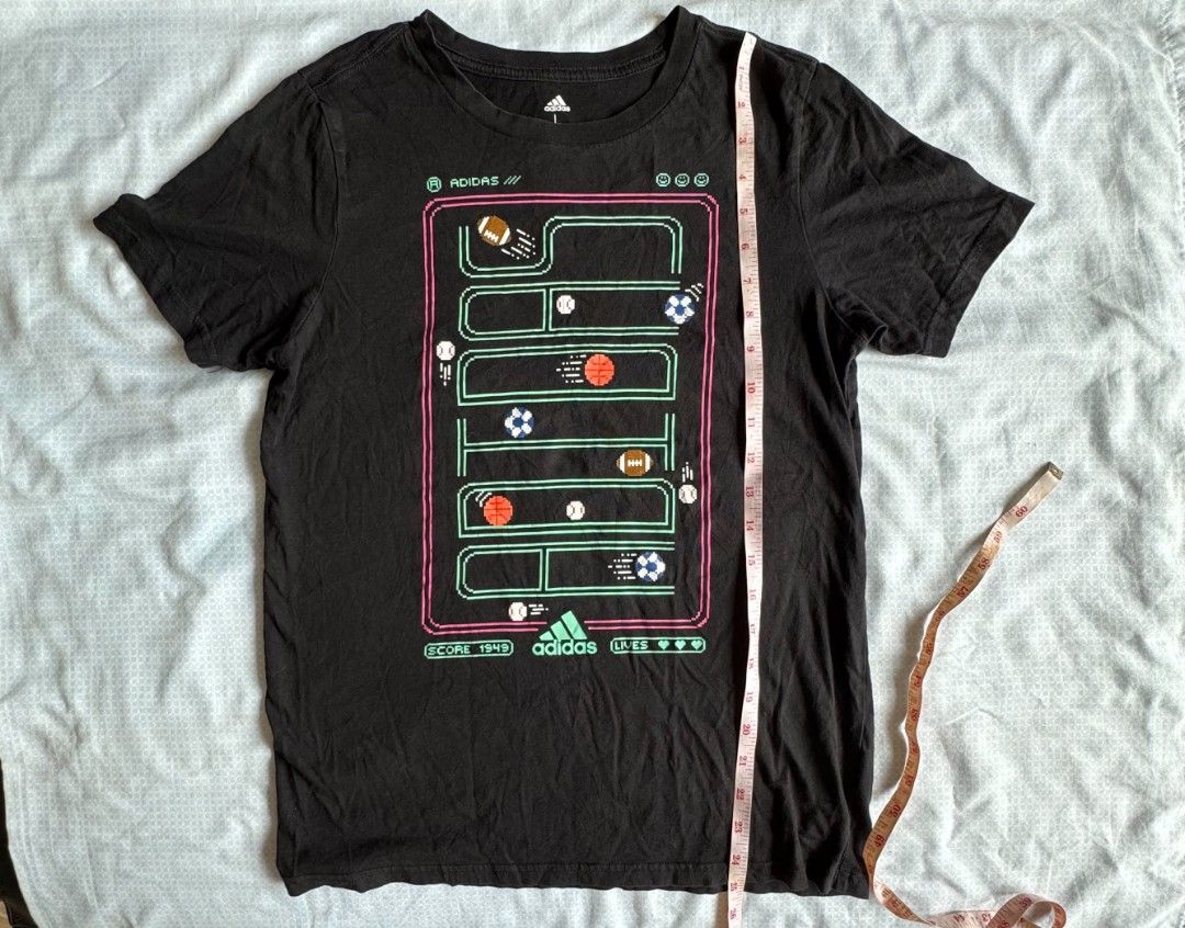 Adidas Retro Video Game Shirt (Category: Tshirts & Polo Shirts ) located in Abucay. Submitted by freestorm.9e265e (Listing ID 1438747481, Image 3). Description: Large on tag Dimes: 17.5 x 25.