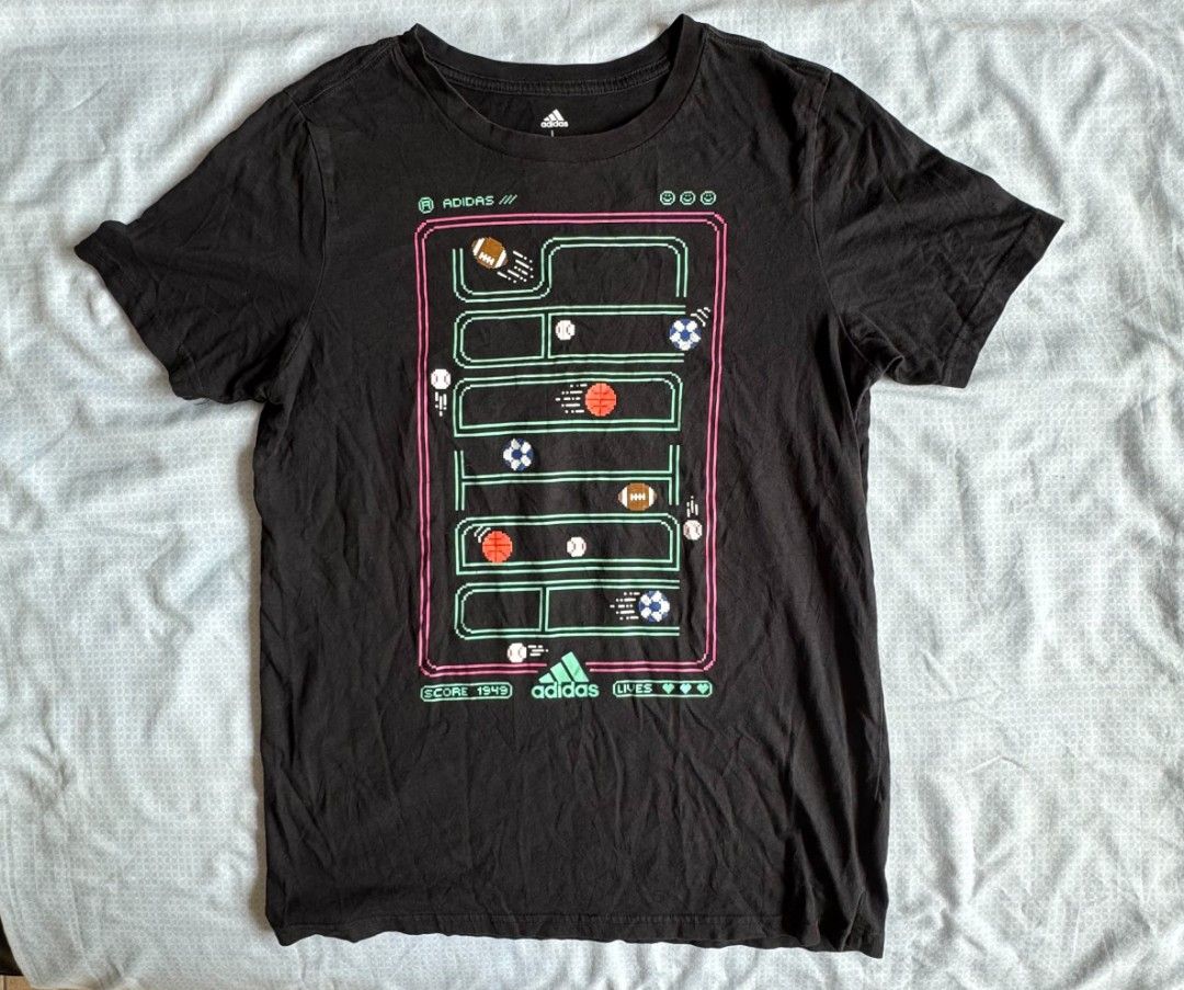 Adidas Retro Video Game Shirt (Category: Tshirts & Polo Shirts ) located in Abucay. Submitted by freestorm.9e265e (Listing ID 1438747481, Image 1). Description: Large on tag Dimes: 17.5 x 25.