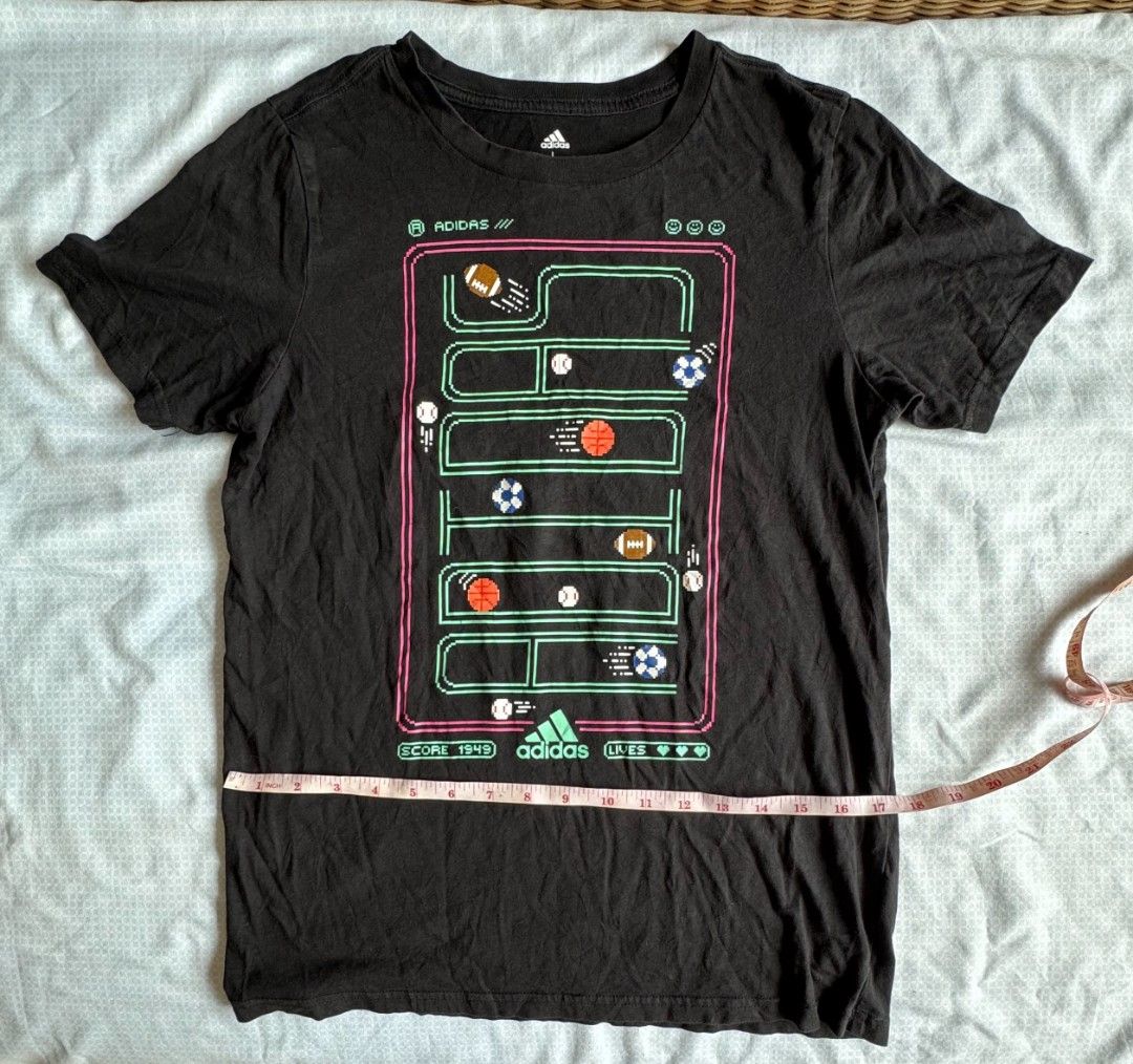 Adidas Retro Video Game Shirt (Category: Tshirts & Polo Shirts ) located in Abucay. Submitted by freestorm.9e265e (Listing ID 1438747481, Image 2). Description: Large on tag Dimes: 17.5 x 25.
