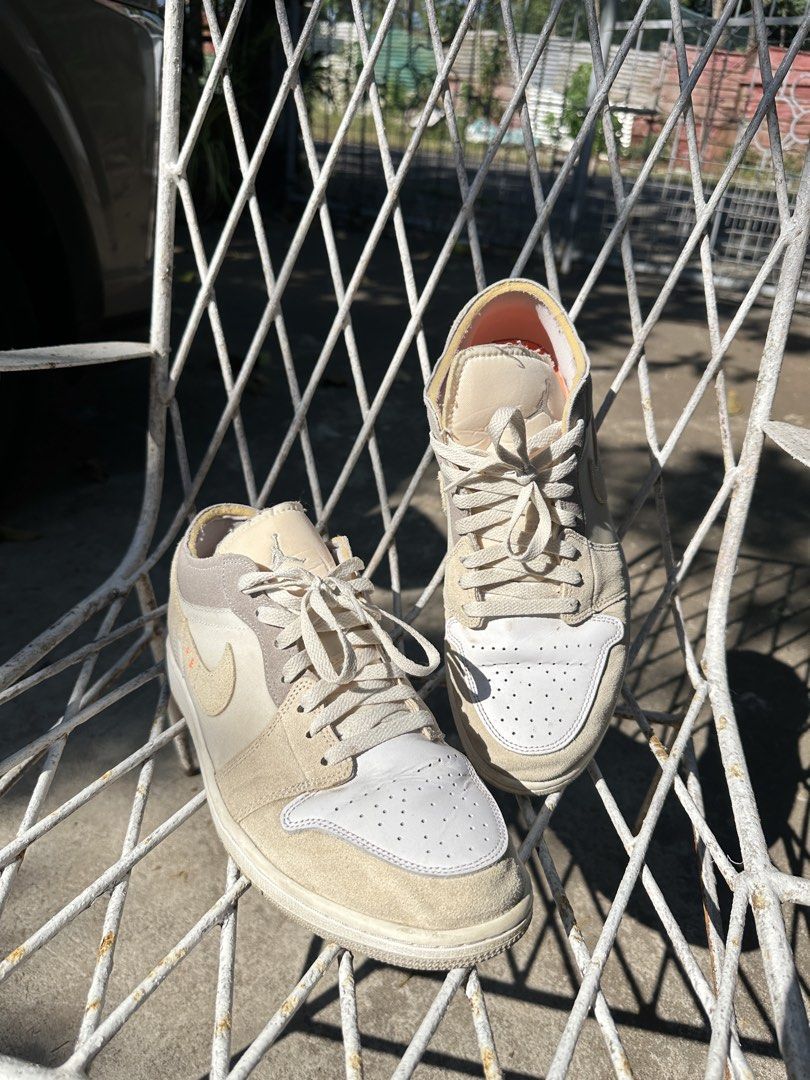 Air Jordan 1 Low SE Craft (Category: Sneakers) located in Manila. Submitted by jampasabuy.jpn (Listing ID 1438826390, Image 1). Description: - Air Jordan 1 Low SE Craft sneakers - Size 11 - Cream and white colorway - Suede and leather upper - Includes original box - Classic design with Nike swoosh - Perfect for casual wear.