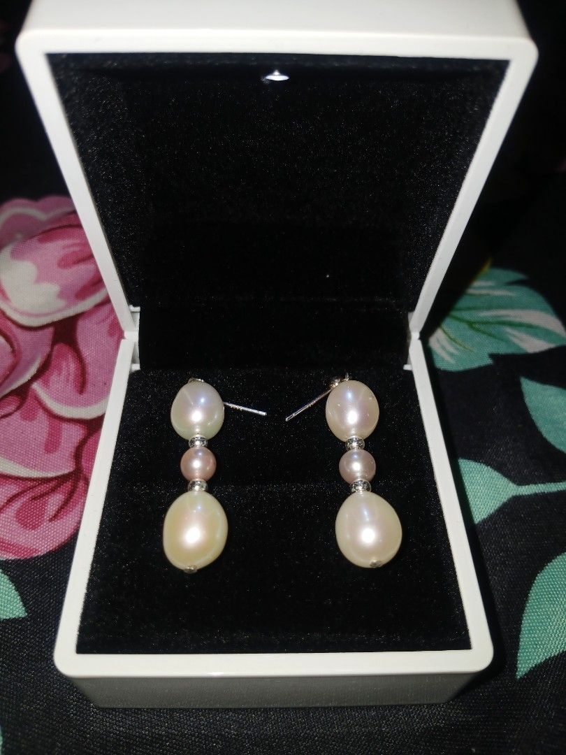 Akoya & Freshwater Pearl Dangle Earrings in Silver Setting (Category: Earrings) located in Sariaya. Submitted by cuatrocats (Listing ID 1438743186, Image 3). Description: - A luxurious combination of high-luster Akoya pearls and Freshwater pearls - Elegant 3-tier vertical drop featuring a mix of natural white and soft rose-pink tones - Features intricate silver spacer that add a touch of vintage sparkle between the pearls - Silver setting is hypo
