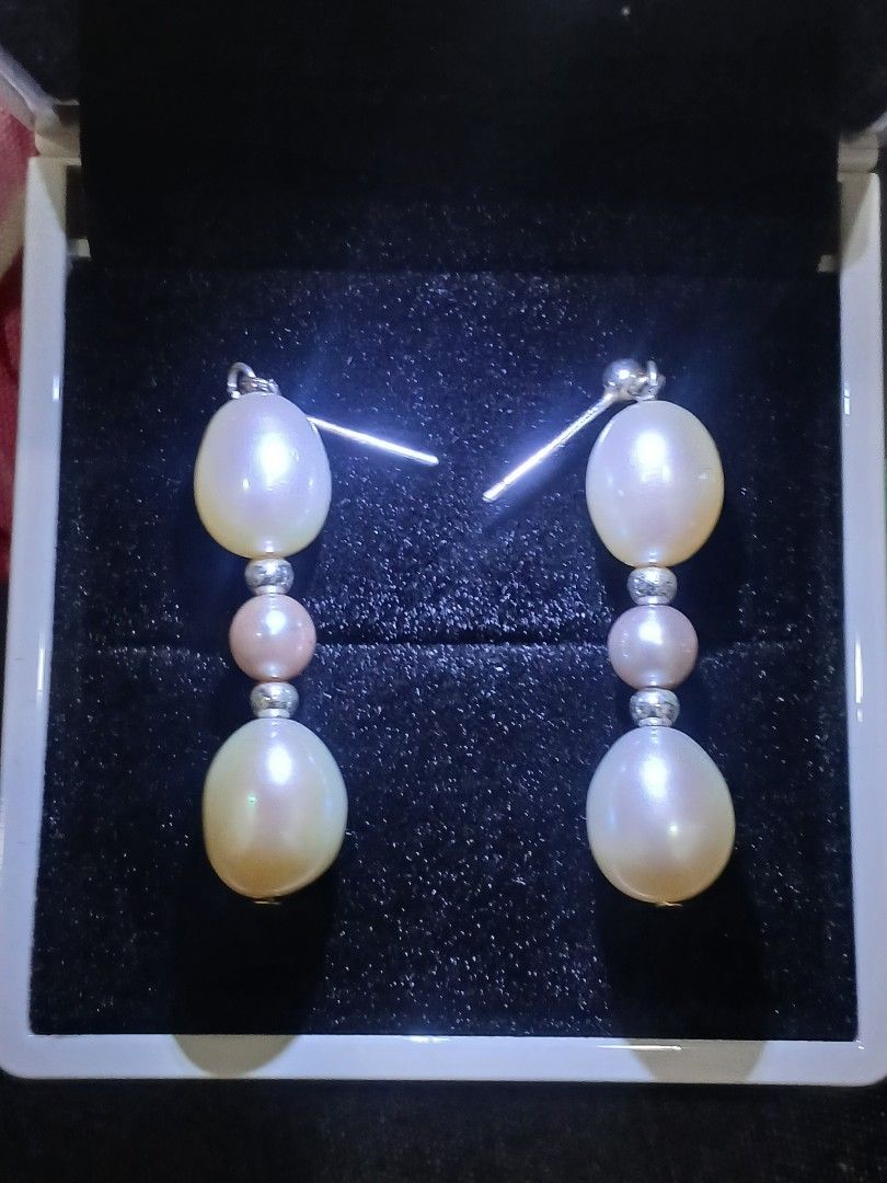 Akoya & Freshwater Pearl Dangle Earrings in Silver Setting (Category: Earrings) located in Sariaya. Submitted by cuatrocats (Listing ID 1438743186, Image 2). Description: - A luxurious combination of high-luster Akoya pearls and Freshwater pearls - Elegant 3-tier vertical drop featuring a mix of natural white and soft rose-pink tones - Features intricate silver spacer that add a touch of vintage sparkle between the pearls - Silver setting is hypo