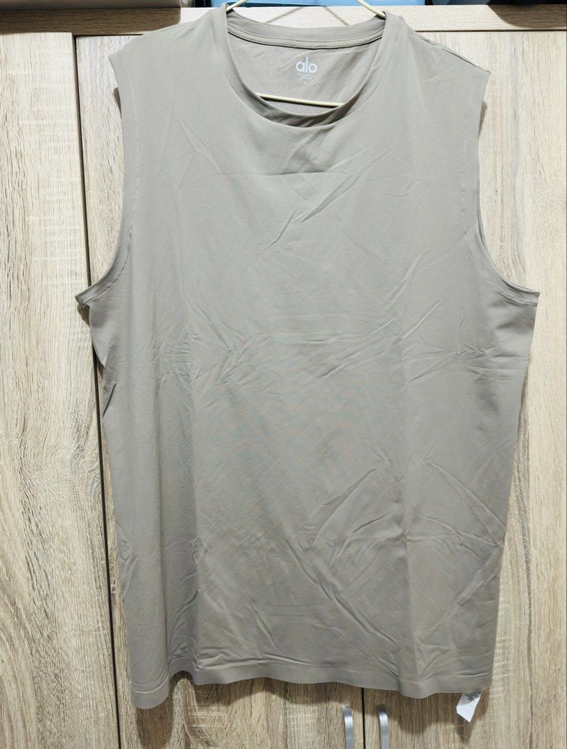 ALO Conquer muscle tank top sando (Category: Activewear) located in Calamba. Submitted by nympha0630 (Listing ID 1438764168, Image 1). Description: Orig Like new condition Used once lng malaki sa asawa ko. Large frame male .