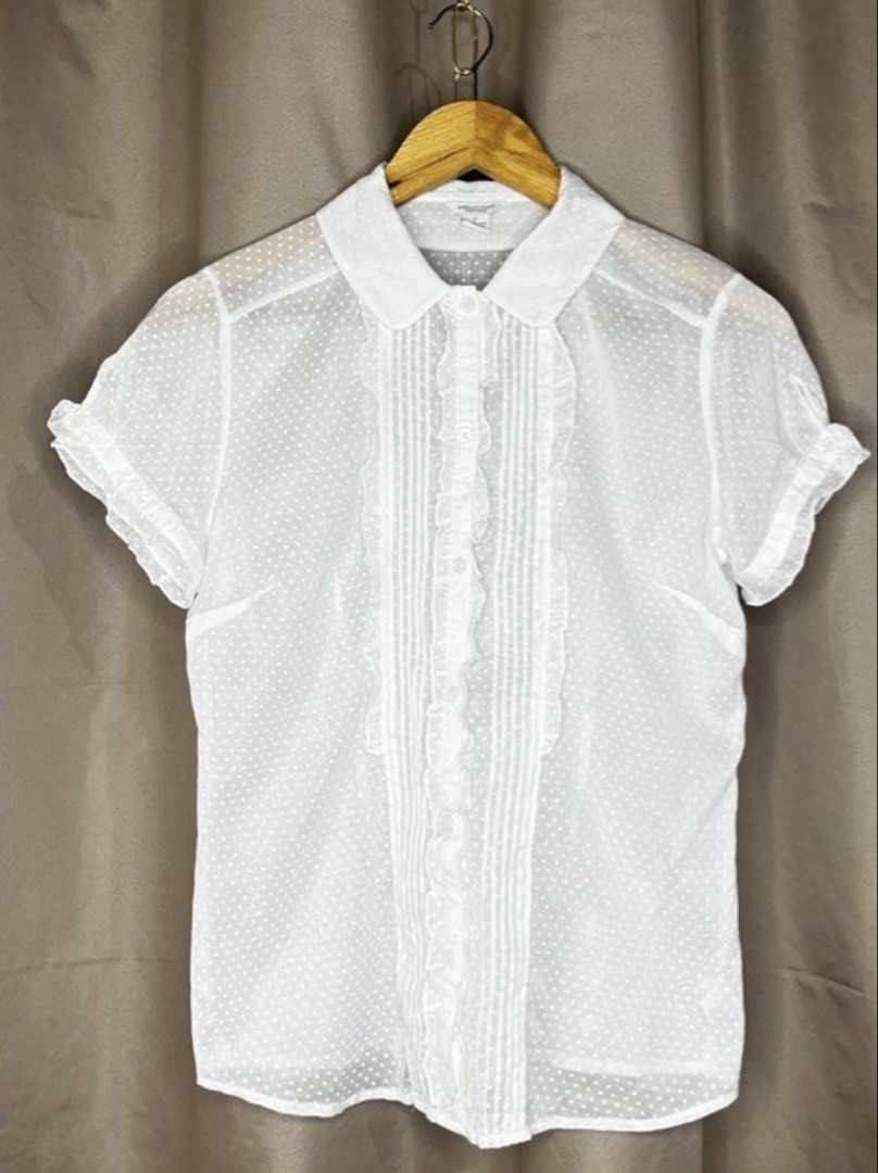 American Eagle Outfitters White Polka Dot Blouse (Category: Blouses) located in Malabon City. Submitted by igigs (Listing ID 1438756966, Image 1). Description: - American Eagle Outfitters blouse - White with polka dot pattern - Ruffled detailing - Short sleeves - Collared neckline - Button-down closure - Size 6 - Made in China.