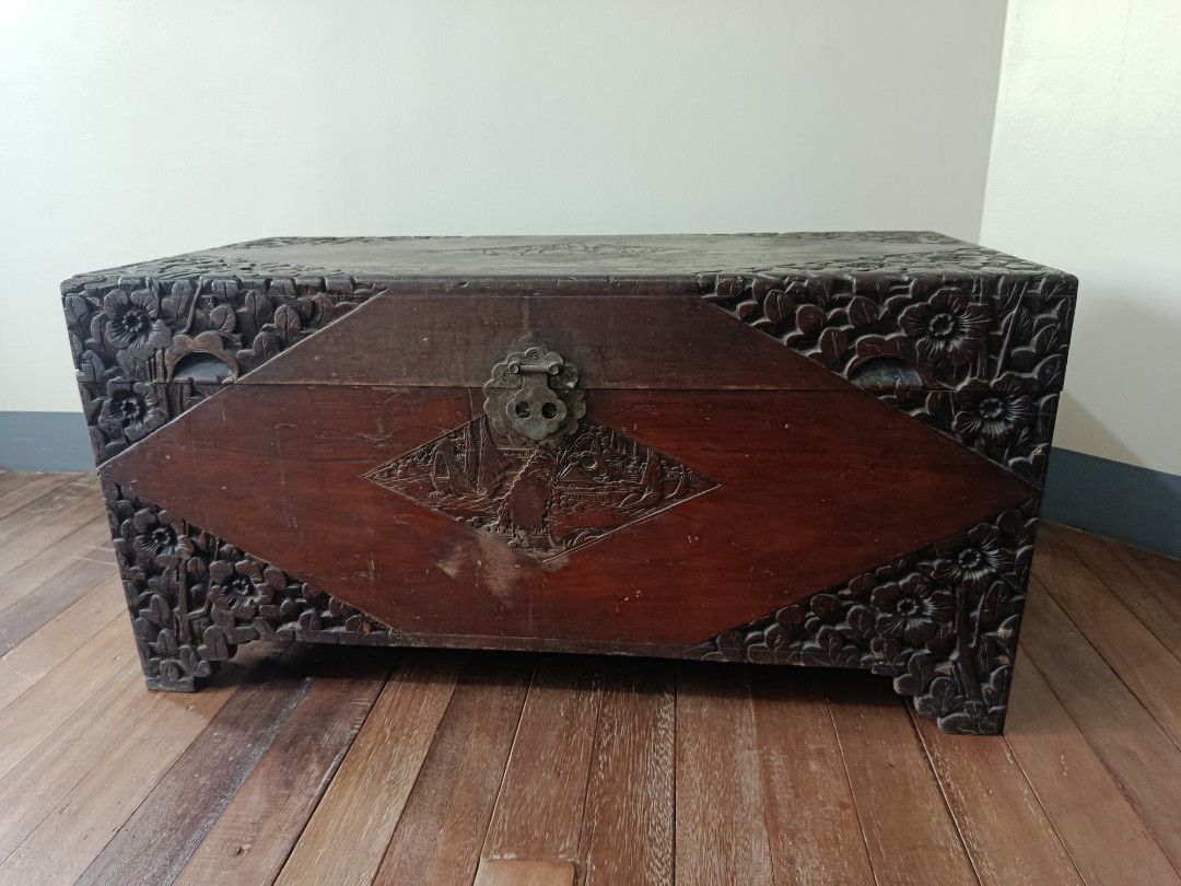 Antique Wooden Chest Baul (Category: Other Home Furniture) located in Quezon City. Submitted by truephoenix.16cee3 (Listing ID 1438838131, Image 1). Description: Vintage wooden chest. This was inherent by my grandmother from her parents. As of 2026, she's now 97 years old. Intricate wood flowers carvings on the side, while boats/ships on the center. Manual measurements: Length 37.25 inches Height 18.5 inches Wide 17.75 inches Location Project 3 Q