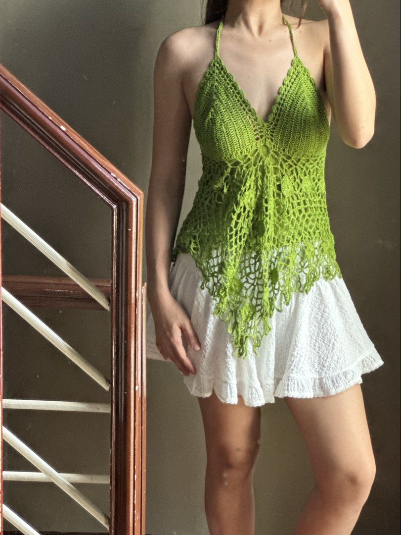 Aquiser Crochet Halter Top (Category: Sleeveless) located in Calasiao. Submitted by closetniporsh (Listing ID 1435836898, Image 1). Description: - Vibrant green color - V-neck design - Unique open-weave pattern - Halter tie - Flattering fit - Great for summer -not the typical shein crochet. From the aquiser po 😊💕 .
