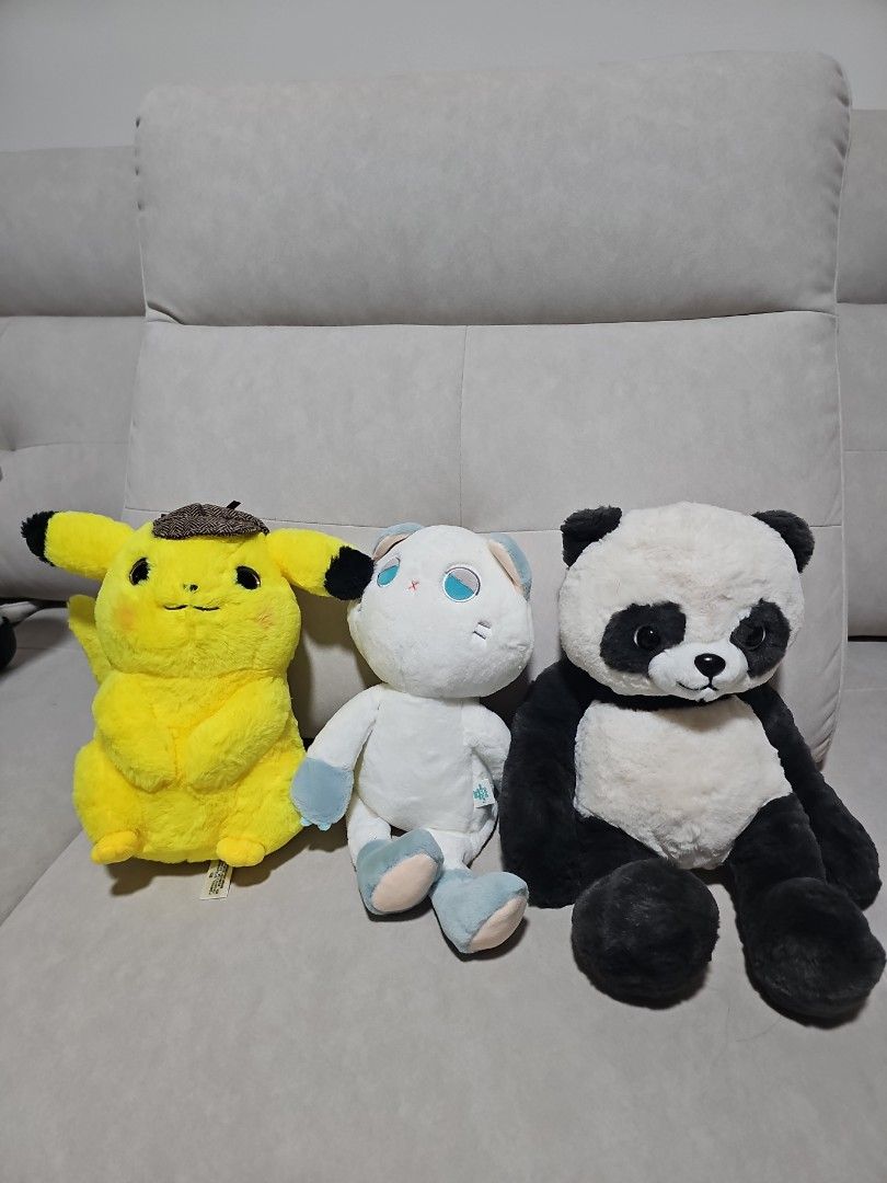 Assorted Plush Toys - Panda, Bunny, Pikachu (Category: Toys & Games) located in Singapore. Submitted by xavcier12 (Listing ID 1438826346, Image 1). Description: - Adorable plush toy bundle! ( Each for $15, bundle of 3 $30) - Includes: Panda, White Bunny with blue accents, and Detective Pikachu. - Perfect for collectors or gifts. - Soft and cuddly!.