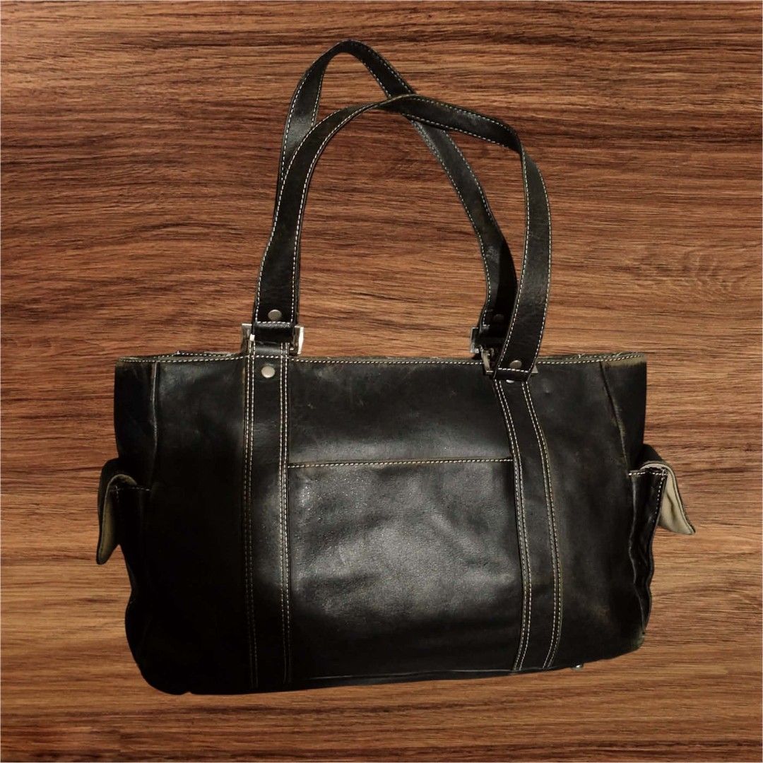 Auth Levenger Black Genuine Leather Shoulder Bag (Category: Shoulder Bags) located in Cebu City. Submitted by jc_online_shop (Listing ID 1438822330, Image 1). Description: 12" x 10" x 4" with 2 side pockets zipper.closure genuine leather material.