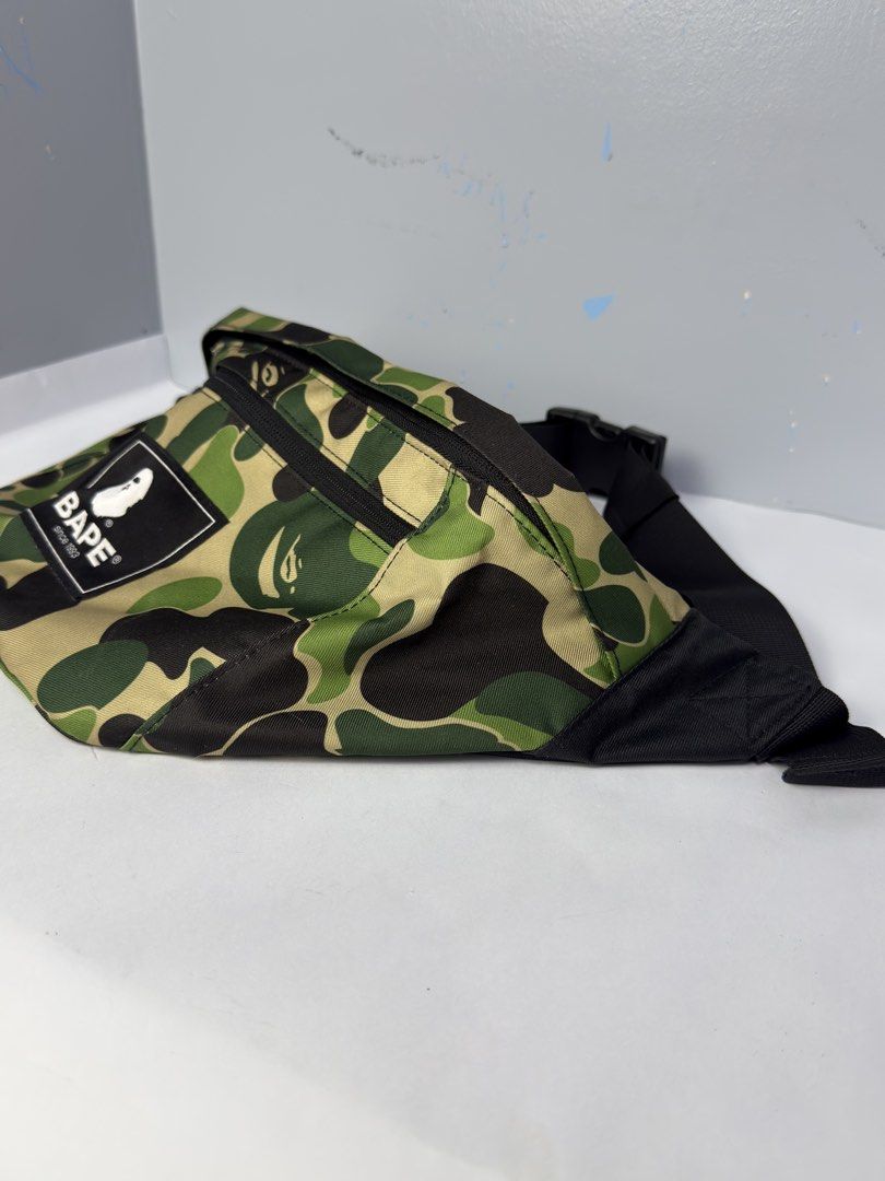 BAPE Camo Waist Bag (Category: Belt bags, Clutches and Pouches) located in Manila. Submitted by dipdrip (Listing ID 1438777188, Image 3). Description: - Authentic BAPE waist bag - Iconic camo pattern - Main compartment - Front zippered pocket - Adjustable strap with buckle closure - BAPE logo on front Condition In excellent condition 1,500php Negotiable Open for COD via Lalamove around Metro Manila.