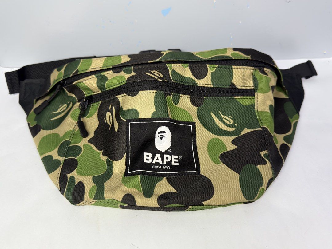 BAPE Camo Waist Bag (Category: Belt bags, Clutches and Pouches) located in Manila. Submitted by dipdrip (Listing ID 1438777188, Image 1). Description: - Authentic BAPE waist bag - Iconic camo pattern - Main compartment - Front zippered pocket - Adjustable strap with buckle closure - BAPE logo on front Condition In excellent condition 1,500php Negotiable Open for COD via Lalamove around Metro Manila.