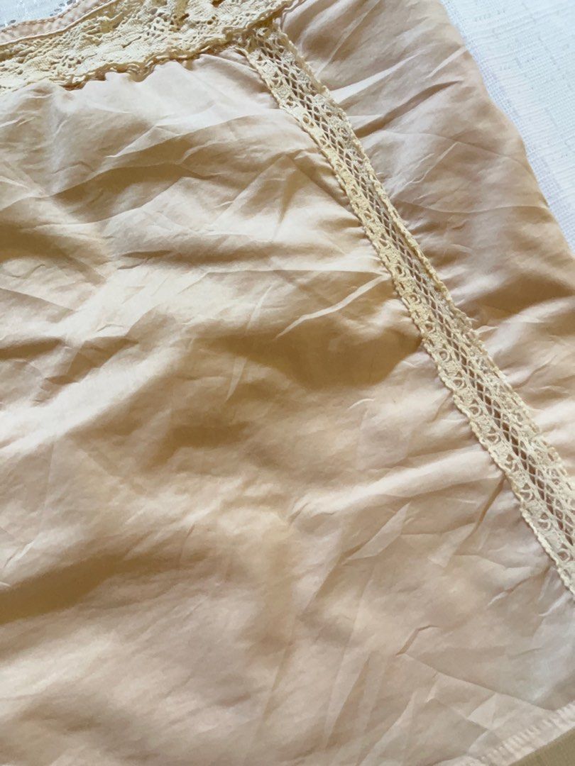 Beige lace trim camisole top (Category: Others Tops) located in Lianga. Submitted by preyala (Listing ID 1438808114, Image 3). Description: Beige lace trim camisole top Size: Small Bust: 30-31 Length: 14 Mine 199 Grab 229 Grabbing ends at 10:00 PM (today).