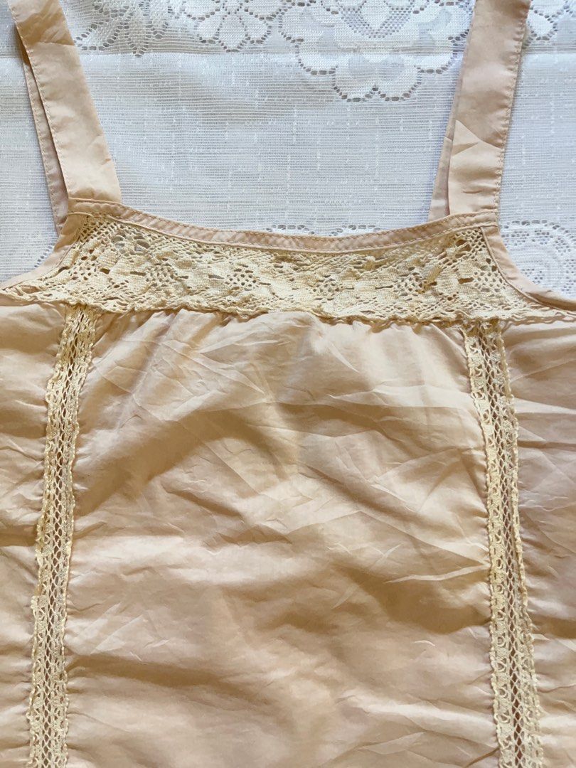 Beige lace trim camisole top (Category: Others Tops) located in Lianga. Submitted by preyala (Listing ID 1438808114, Image 2). Description: Beige lace trim camisole top Size: Small Bust: 30-31 Length: 14 Mine 199 Grab 229 Grabbing ends at 10:00 PM (today).