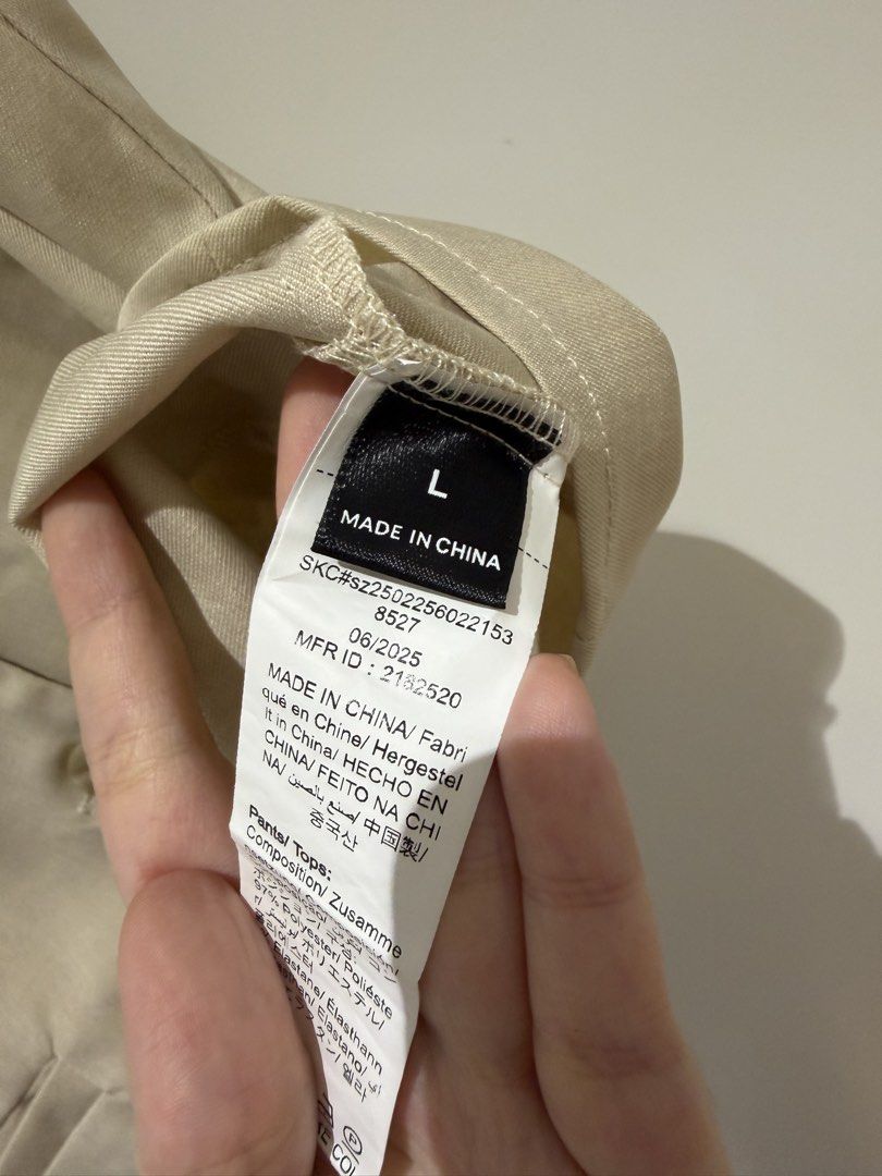 Beige Vest and Shorts Set - Size L (Category: Sets or Coordinates) located in Makati City. Submitted by delr2191 (Listing ID 1438740148, Image 2). Description: - Beige vest and shorts set - Vest features a V-neck and button closure - Shorts have a button and zipper closure with pleats - Vest size: L - Made in China Used once.