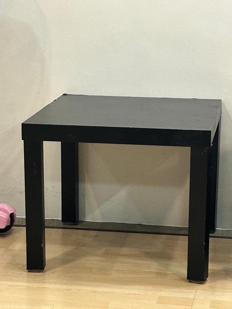 Black Square Side Table (Category: Tables & Sets) located in Singapore. Submitted by sammy_12345 (Listing ID 1438793921, Image 1). Description: - Black square side table - Perfect for small spaces - Solid and sturdy - Suitable for living room or bedroom.