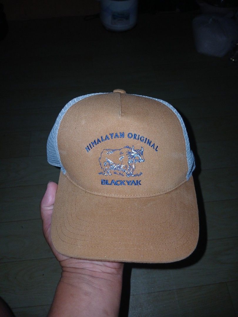 Black Yak Himalayan Original Trucker Cap (Category: Caps & Hats) located in General Santos City (Dadiangas). Submitted by afsph1996 (Listing ID 1438699168, Image 1). Description: - Black Yak cap -one size fits all - Brown front panel with "Himalayan Original" logo - Gray mesh back - Curved brim - Size: 58cm - Perfect for outdoor activities or casual wear.