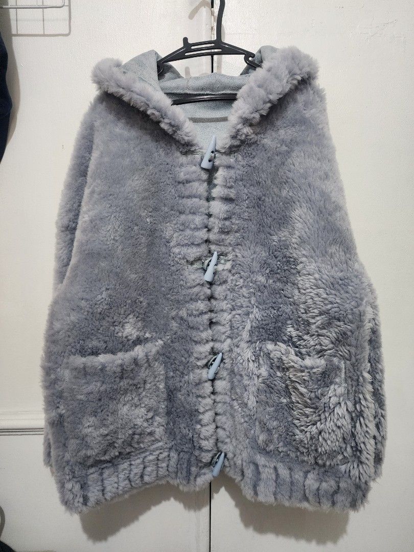 Blue Grey Faux Fur Coat with Toggle Closures (Category: Coats, Jackets and Outerwear) located in Marikina City. Submitted by guierocha (Listing ID 1438765876, Image 1). Description: Winter Jacket with 2 Pockets and Hood Wore once in Mongolia (-30° Weather) Bought in South Korea Fits Medium-Large Needs combing ng fur 😅 SF by Buyer 📍Marikina Heights, Marikina City.